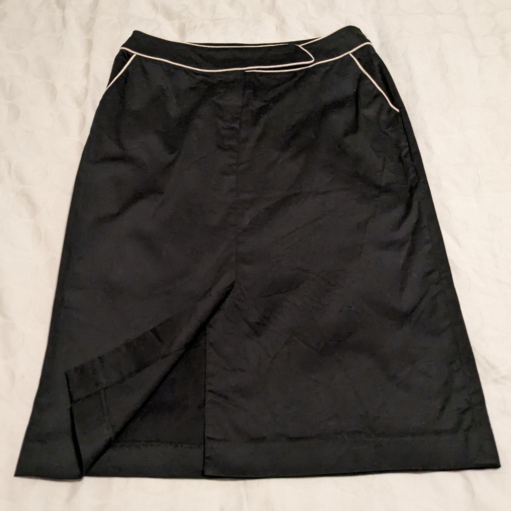 Cotton A-line Skirt w/ pockets, front split, & piping detail on waistband